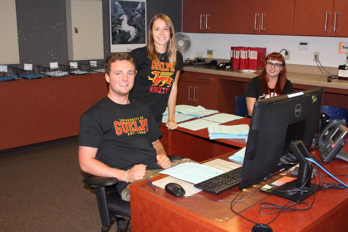 Picture of staff at front desk