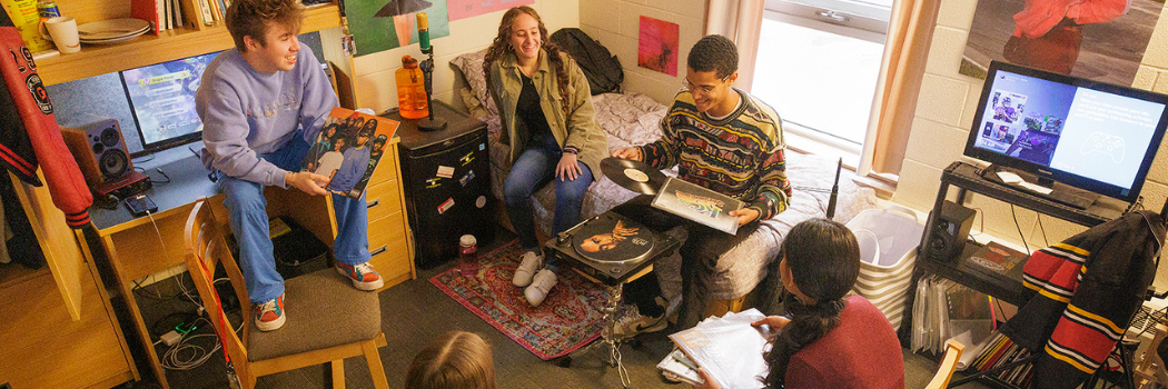 Students socializing in a Lennox and Addington Double Room