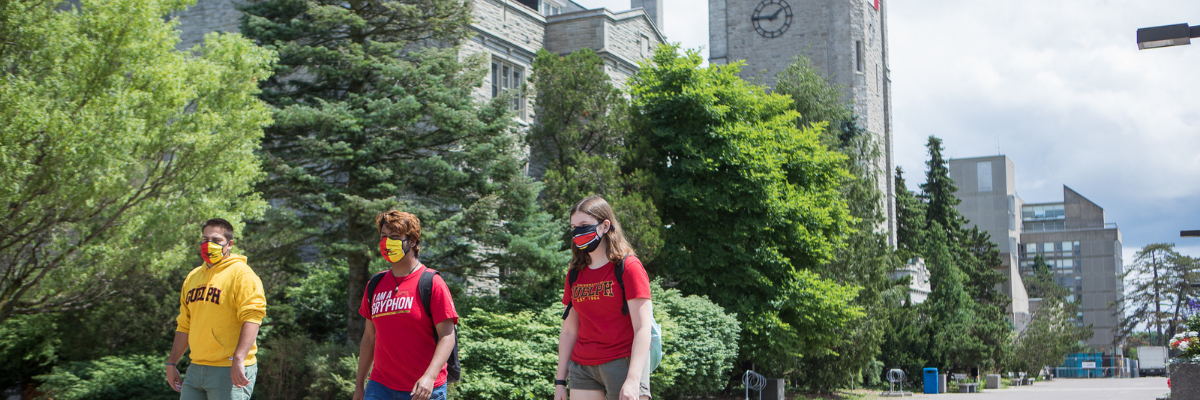 Students walking in front of Johnston Hall. 